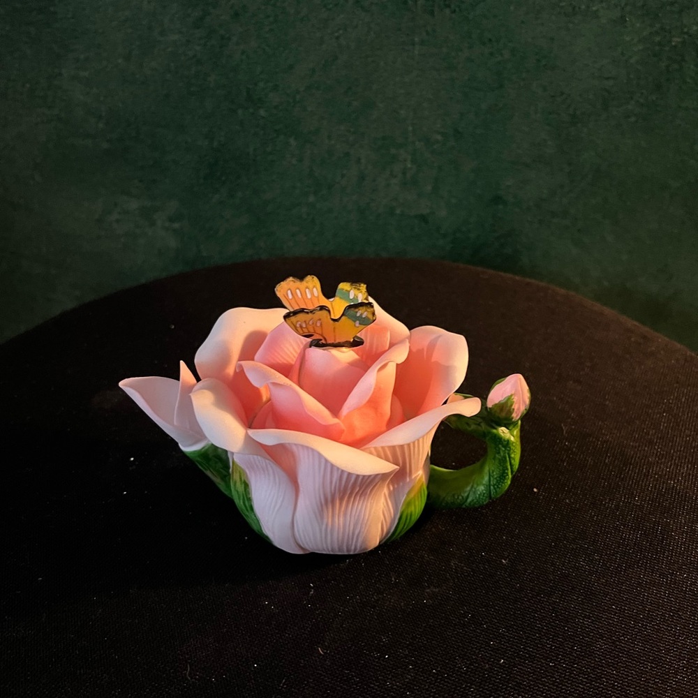Decorative butterfly tea kettle